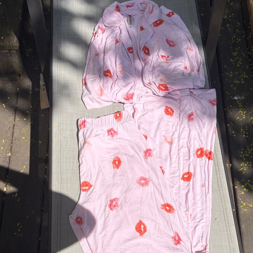 SKIMS Cherry Blossom Pink Pajama Set with Red Lip Print